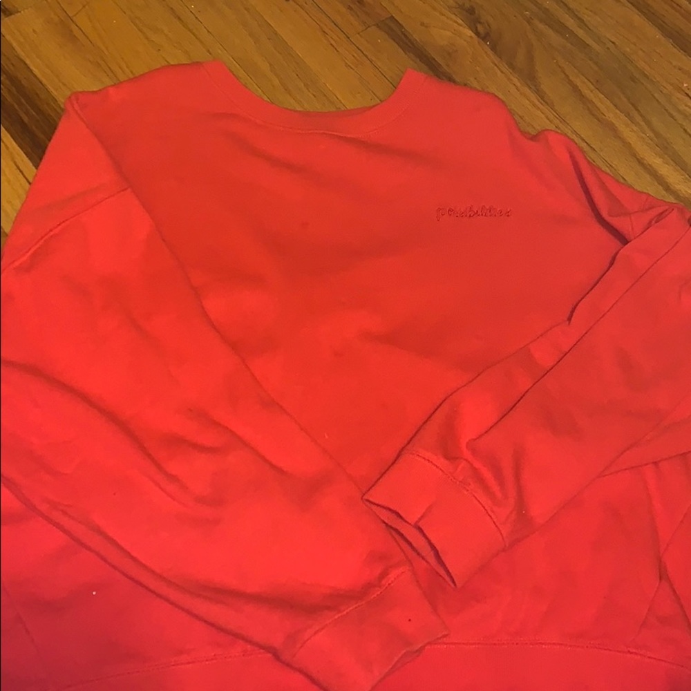 H&M red sweatshirt.